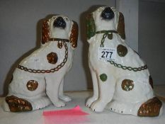 A pair of Staffordshire dogs.