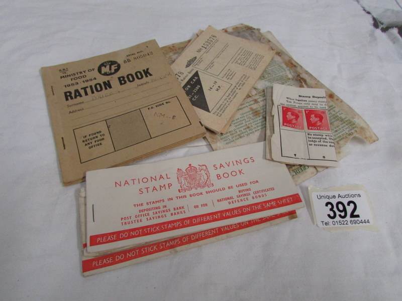 A pack of postal orders, ration books, petrol books. saving books etc.
