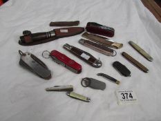 A quantity of old pen knives including sheath knife.