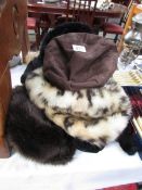 A quantity of fur hats.