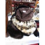 A quantity of fur hats.