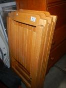 3 folding wooden chairs,