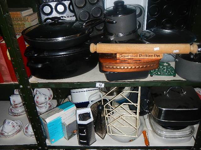 2 shelves of assorted kitchen ware.