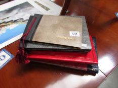 6 old photo albums, mainly empty.