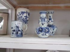 A Meissen oil lamp base, 2 Delft vases (1 a/f) and a Delft tankard.