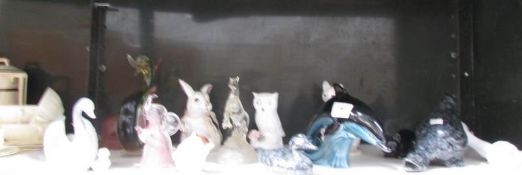 A shelf of assorted animals including Poole.