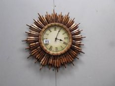 A Sunburst wall clock.