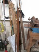 A quantity of vintage fishing rods including 3 piece Allcock split can rod in tan canvas case,