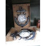 2 new and boxed clocks in the shape of anchors.