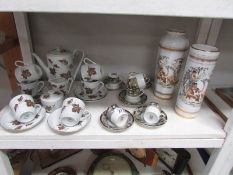 2 Greek vases, an Ivy patterned tea set, 6 Japanese coffee cans and saucers.