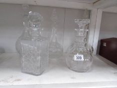 5 good quality glass decanters.