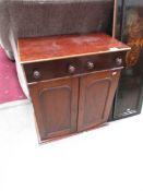 A mahogany cabinet.