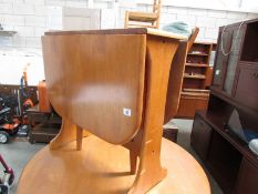 A drop leaf table.