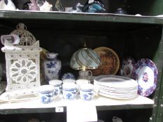 A shelf of miscellaneous including blue and white mugs, plates, lantern etc,,