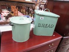 An enamel bread bin and an enamel flour bin.