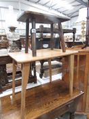 An oak stool and a folding table.