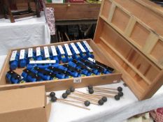 A box of chime bars and beaters.