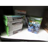 A large quantity of X box games etc.