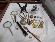 A mixed lot including magnifying glasses.