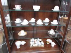 A mixed lot of cups, saucers, egg cups etc including Shelley, Royal Albert etc.