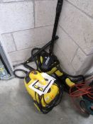 A Karcher pressure washer.