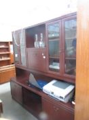 A mahogany effect wall unit.