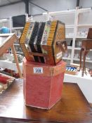 A boxed concertina.