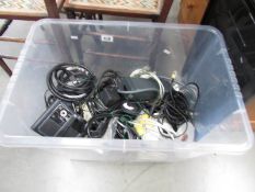 A massive box of computer chargers, scart leads, controls etc.
