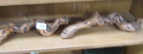 2 driftwood corkscrews.