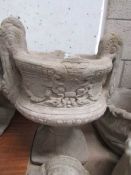 A 2 handled garden urn.