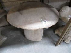 A garden saddle stone.