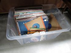 A box of LP and 45 rpm records.