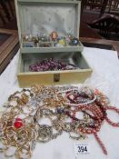 A jewellery box and costume jewellery.