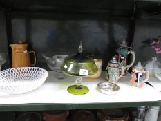 A shelf of miscellaneous including glass ware, beer steins, biscuit barrel etc.