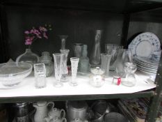 A shelf of glass ware.