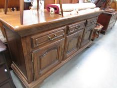 An oak sideboard.