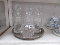 3 Royal Doulton Georgian pattern decanters, a Georgian pattern champagne flute,