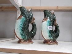 A pair of 19th century majolica fish vases, a/f.