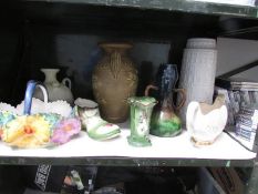 A shelf of vases etc.