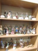 3 shelves of assorted figures, birds etc.