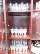A large quantity of drinking glasses.