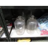 5 glass one gallon bottles,.