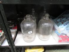 5 glass one gallon bottles,.