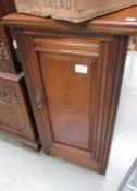 A mahogany pot cupboard.