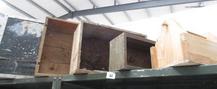 A quantity of wooden tool boxes.