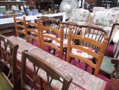 A pair of Ercol kitchen chairs.