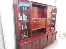 A mahogany effect wall unit.