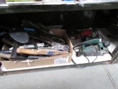 A shelf of assorted tools,