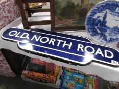 A replica British Railways station totem sign, Old North Road,