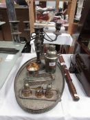 A mixed lot of silver plate including tray, candelabra, cocktail shaker etc.